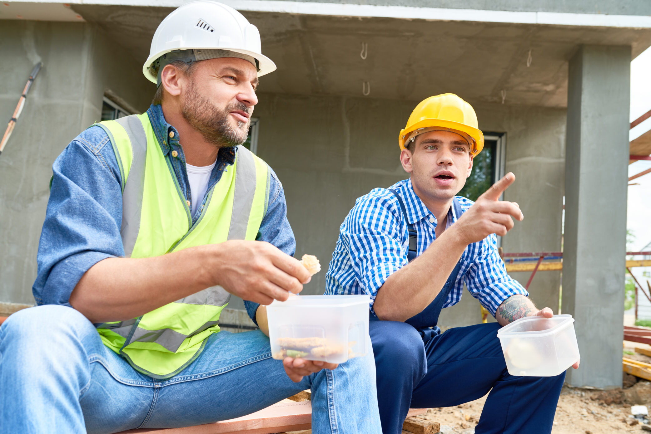 Two roofers having lunch